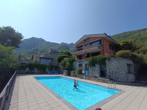 Appartamento IL GELSOMINO con giardino e piscina Corrido